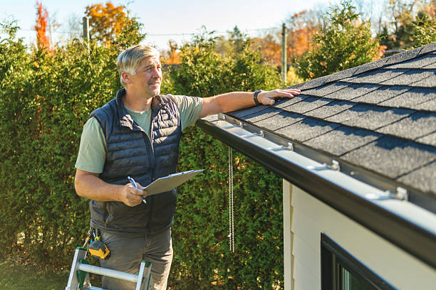 Professional Roof Replacement technician working in Tigrett, TN